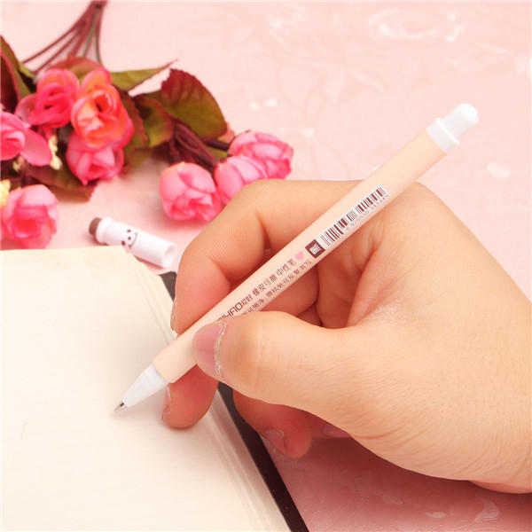 Cartoon smile can be rubbed rubber ball pen